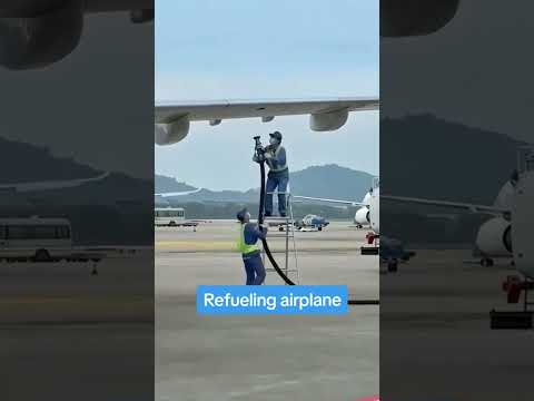 Refuelling aeroplane #refueling #aeroplane #airplane #airport #wing #petrol #airportstaff